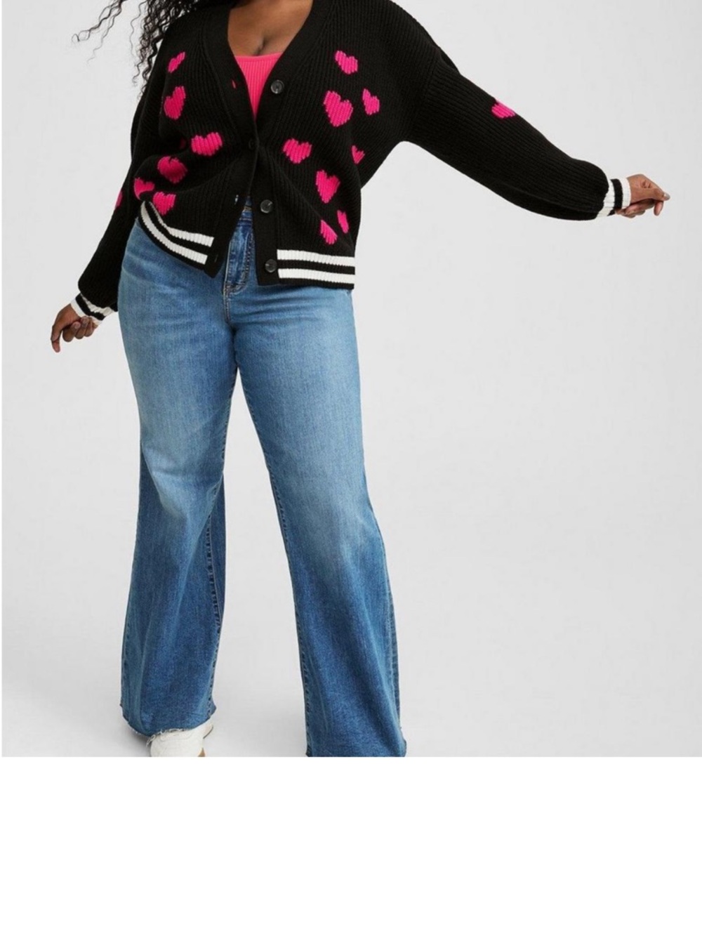 NWT!  Still in packaging bag- unused!
*SALE* Torrid Black Sweater w/Pink Hearts